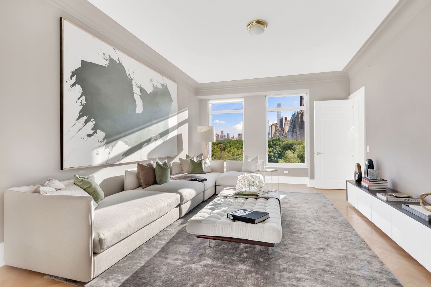 15 Central Park West, Unit 8B Manhattan, NY 10023 - Photo 4 of 13 a living room with furniture and a large window