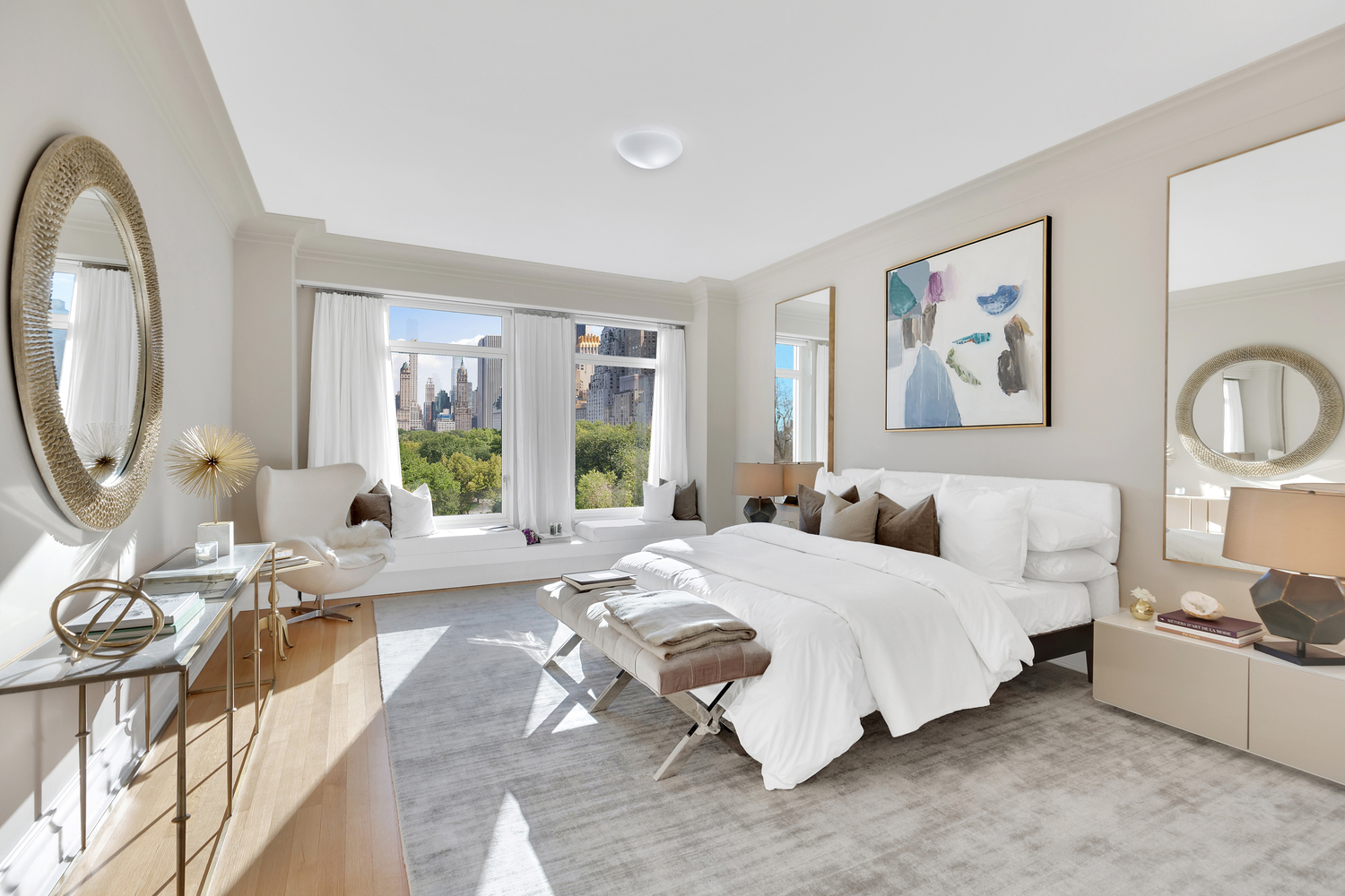 15 Central Park West, Unit 8B Manhattan, NY 10023 - Photo 7 of 13 a spacious bedroom with a bed a dresser next to a large window