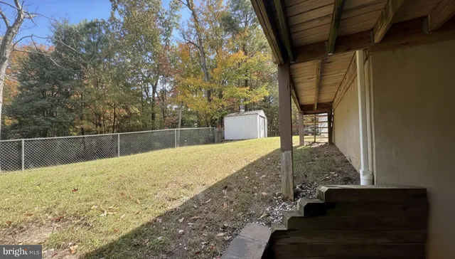 a view of backyard of house