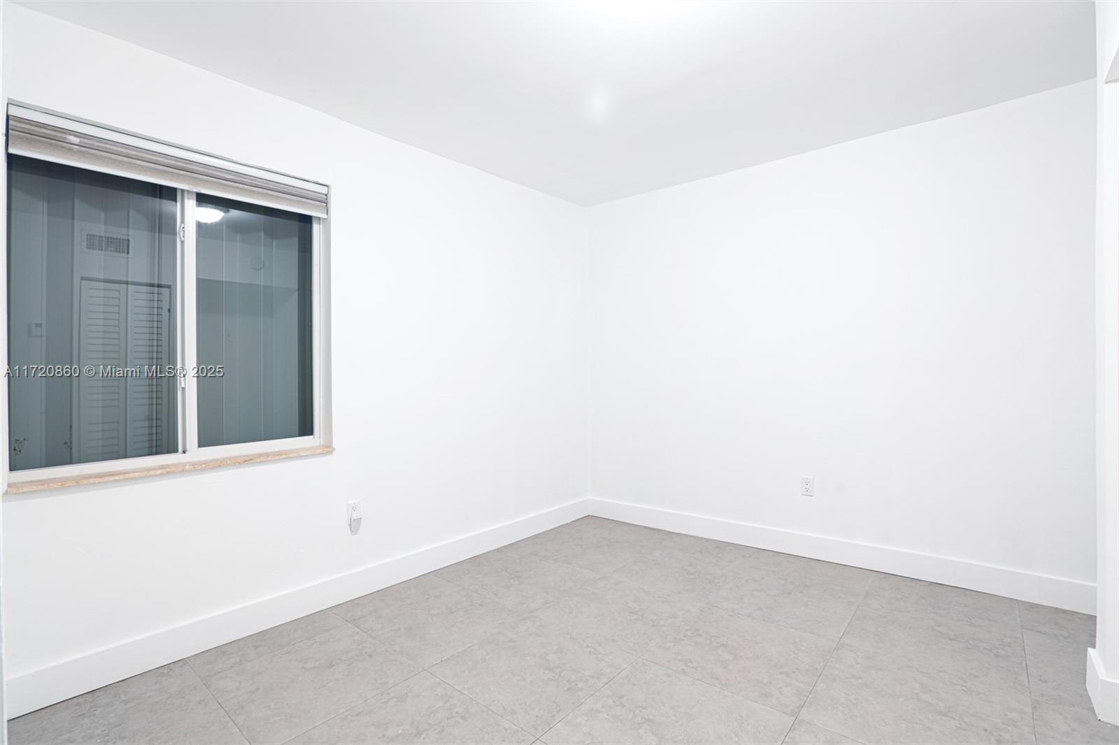 931 79th Terrace, Unit B Miami Beach, FL 33141 - Photo 6 of 9 a view of an empty room