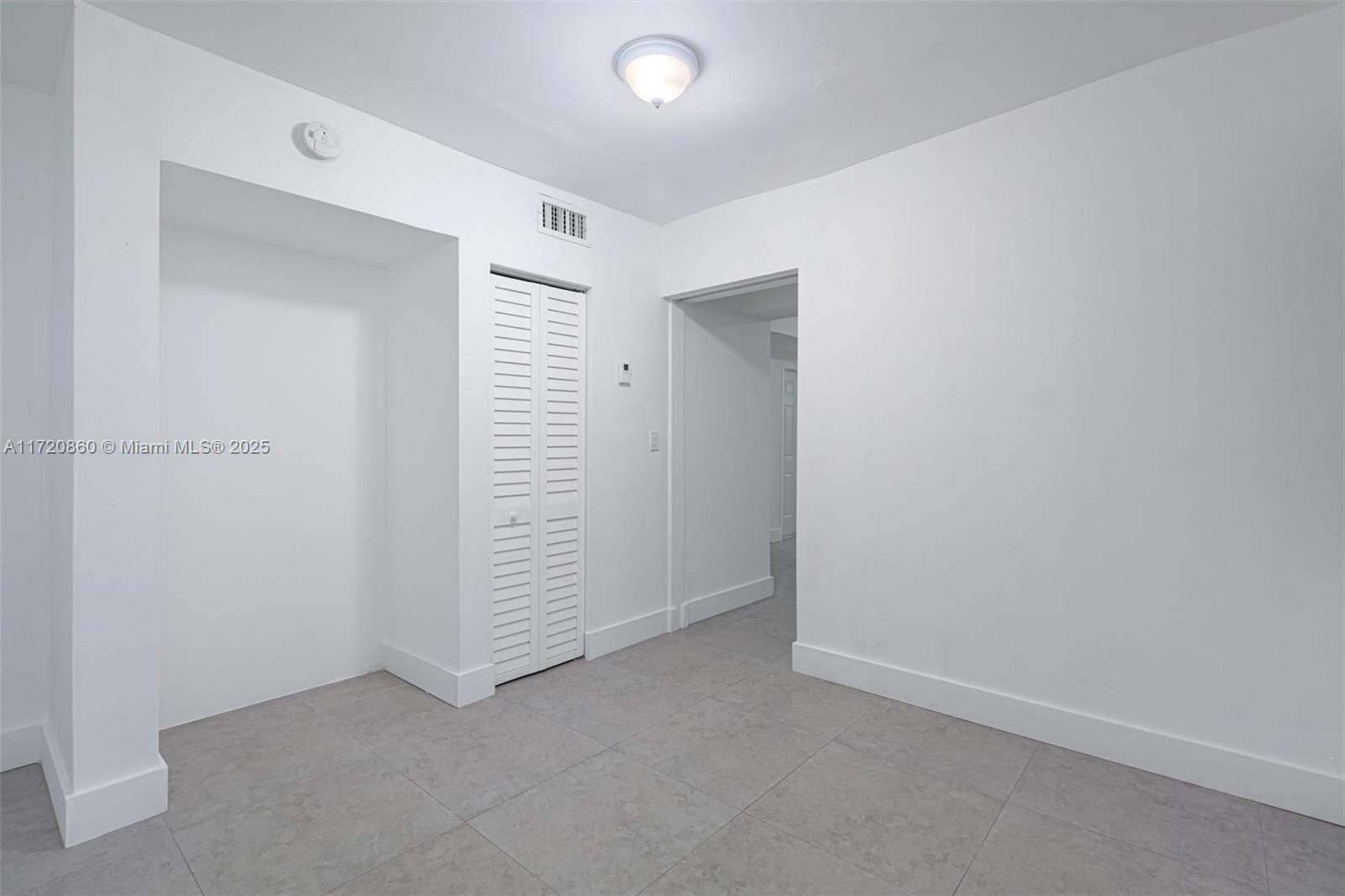 931 79th Terrace, Unit B Miami Beach, FL 33141 - Photo 7 of 9 a view of an empty room