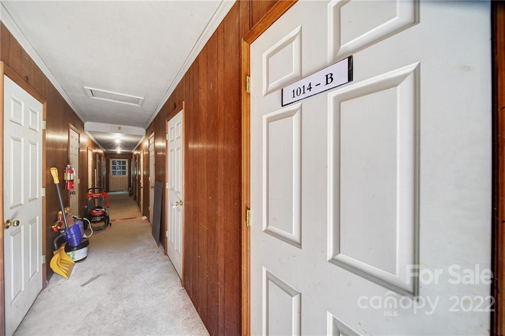 1012 Queens Road, Unit C Charlotte, NC 28207 - Photo 24 of 30 a view of a hallway with a elevator