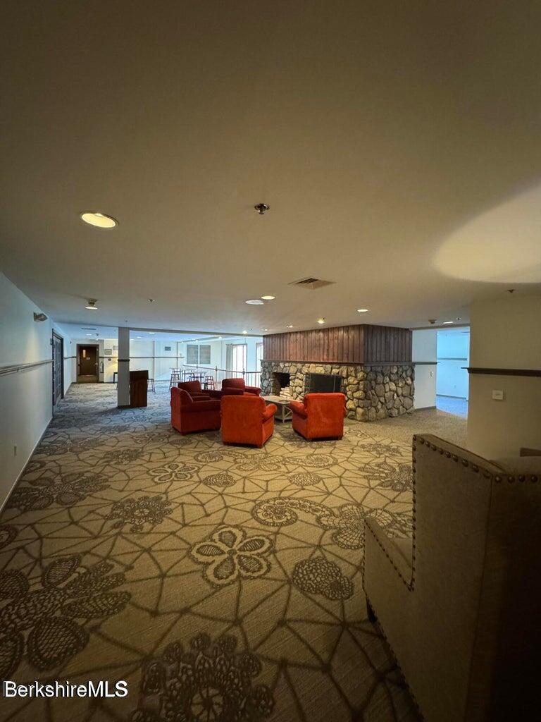 37 Corey Road, Unit 113 Hancock, MA 01237 - Photo 20 of 22 2nd Floor Lobby Fireplace