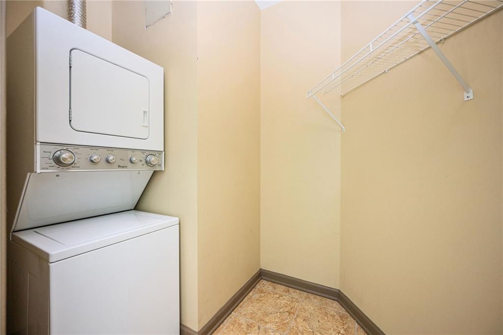 898 Oak Street Southwest, Unit 1418 Atlanta, GA 30310 - Photo 12 of 22 a utility room with dryer and washer