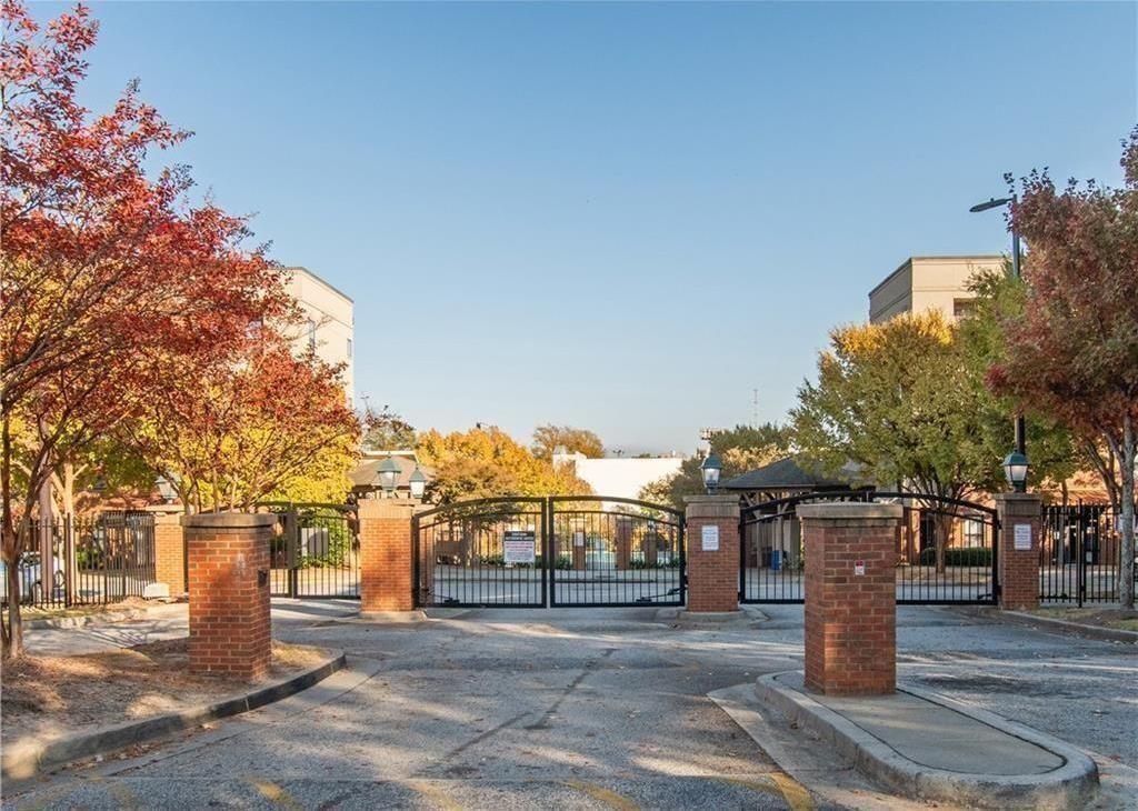 898 Oak Street Southwest, Unit 1418 Atlanta, GA 30310 - Photo 2 of 22 a street view with large trees
