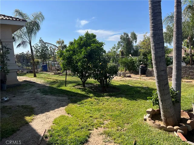 a view of backyard of a house