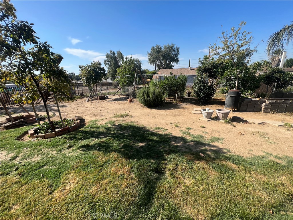 17305 Sage Avenue Riverside, CA 92504 - Photo 19 of 40 a view of backyard of a house