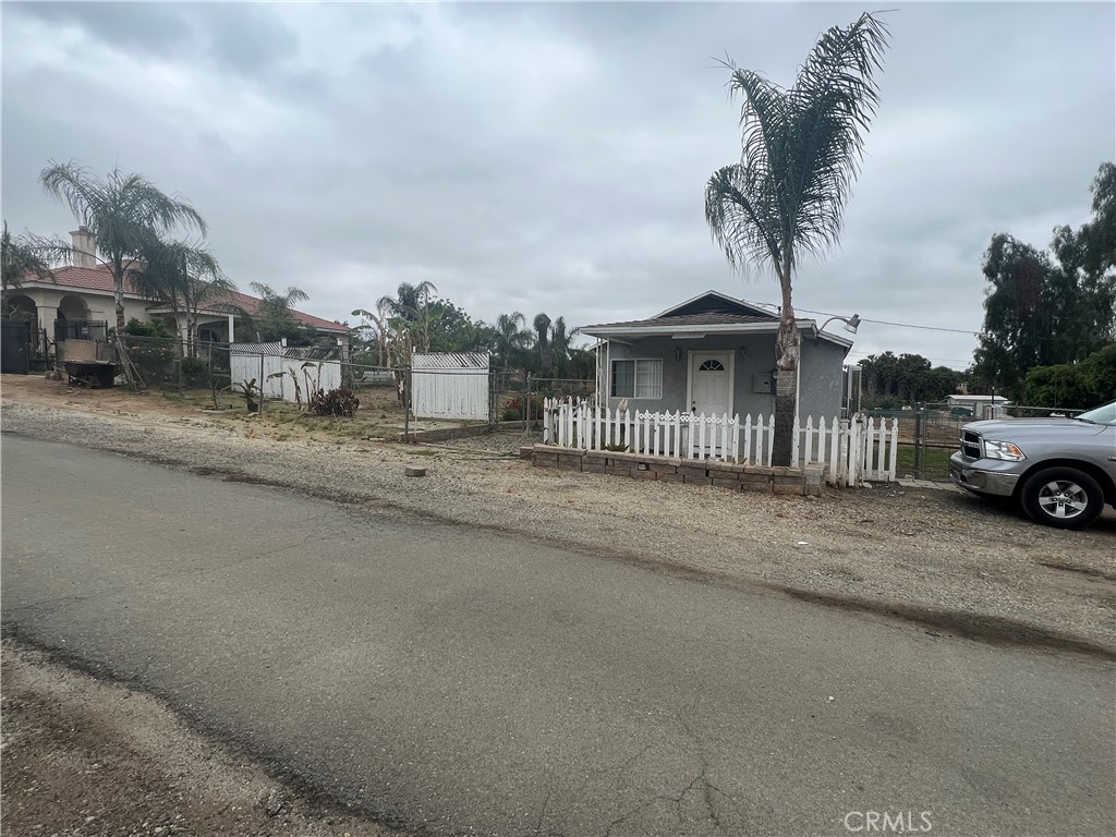 17305 Sage Avenue Riverside, CA 92504 - Photo 21 of 40 a view of a street in front of a house