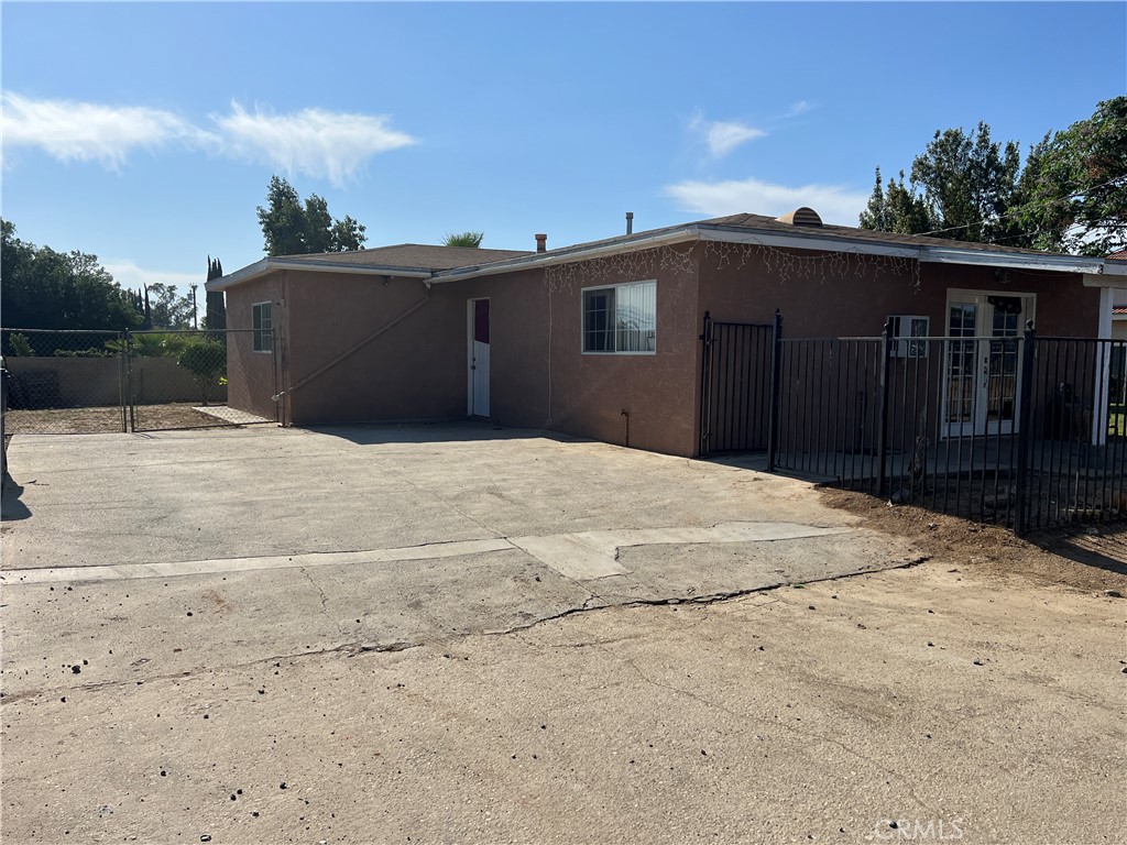 17305 Sage Avenue Riverside, CA 92504 - Photo 22 of 40 a house with trees in the background