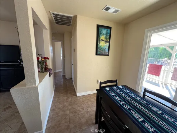 a kitchen with a sink and a refrigerator