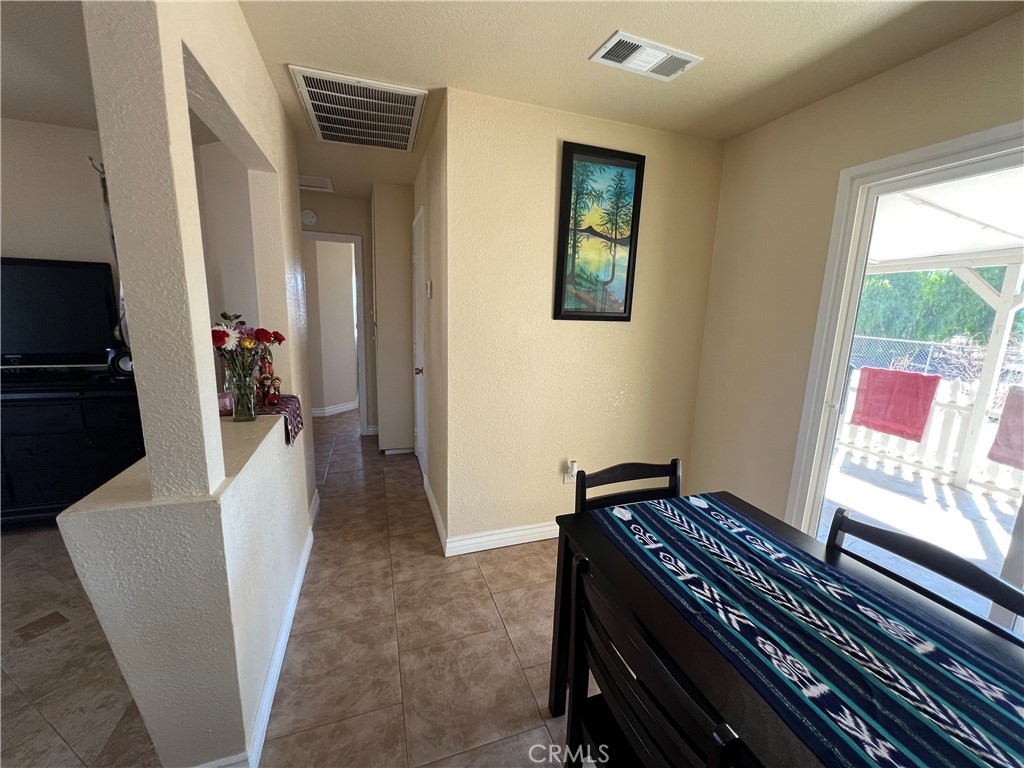 17305 Sage Avenue Riverside, CA 92504 - Photo 35 of 40 a living room with furniture and a window
