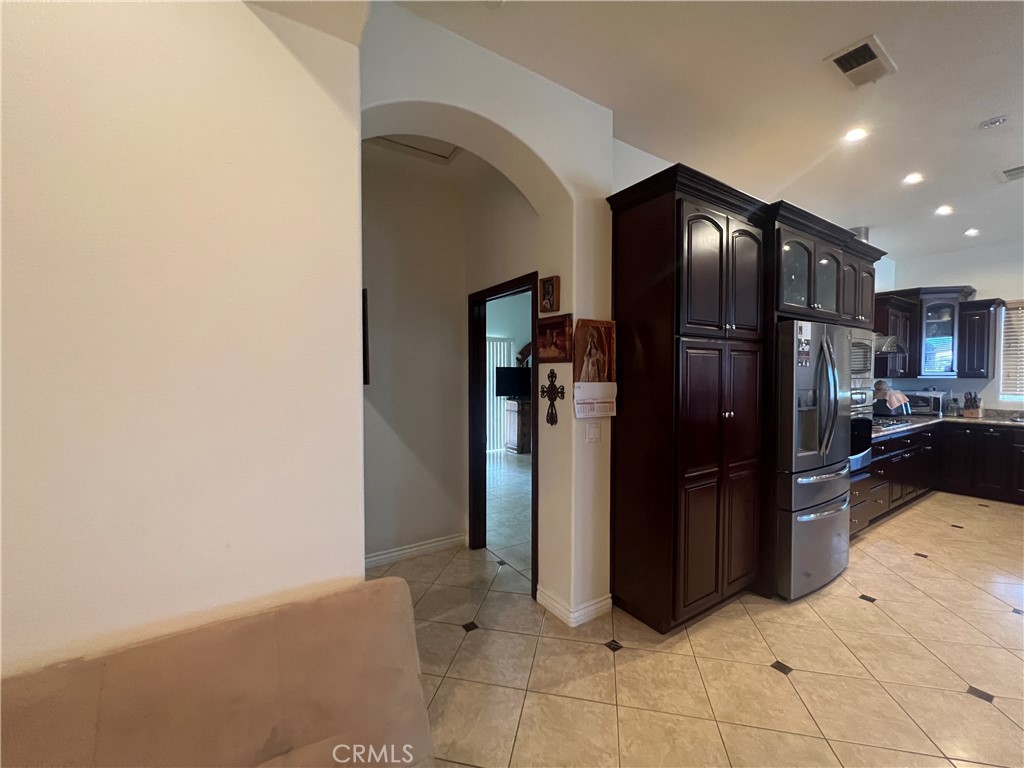 17305 Sage Avenue Riverside, CA 92504 - Photo 4 of 40 a view of a refrigerator and a kitchen