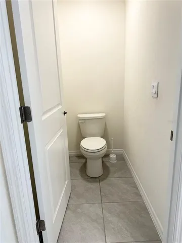 a bathroom with a toilet and a sink