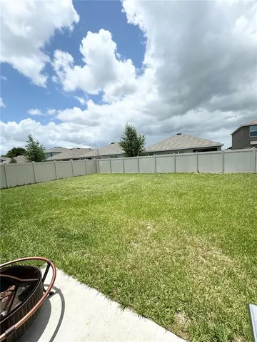 a view of a backyard with plants