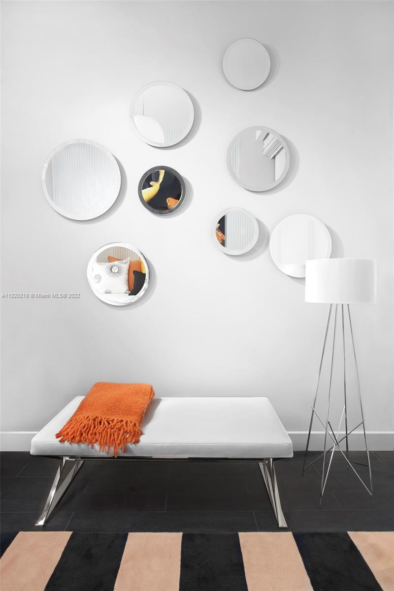 200 Biscayne Blvd Way, Unit 5211 Miami, FL 33131 - Photo 10 of 11 a view of table and chairs in the room