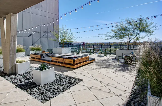 a outdoor space with lots of water fountain in the back