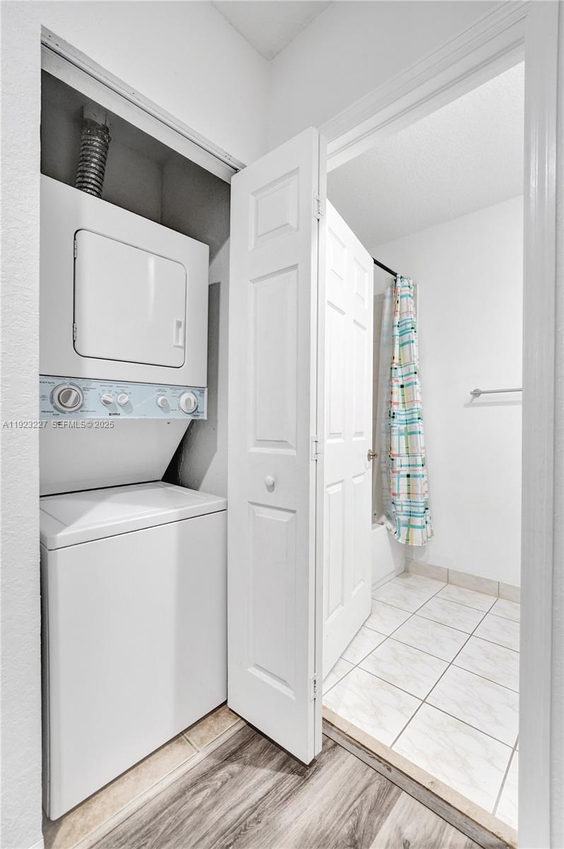 8993 Southwest 17th Court Miramar, FL 33025 - Photo 18 of 41 a utility room with dryer and washer