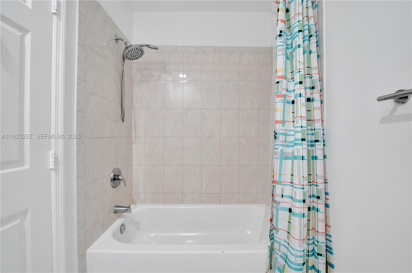 8993 Southwest 17th Court Miramar, FL 33025 - Photo 21 of 41 a bathroom with a bathtub and shower