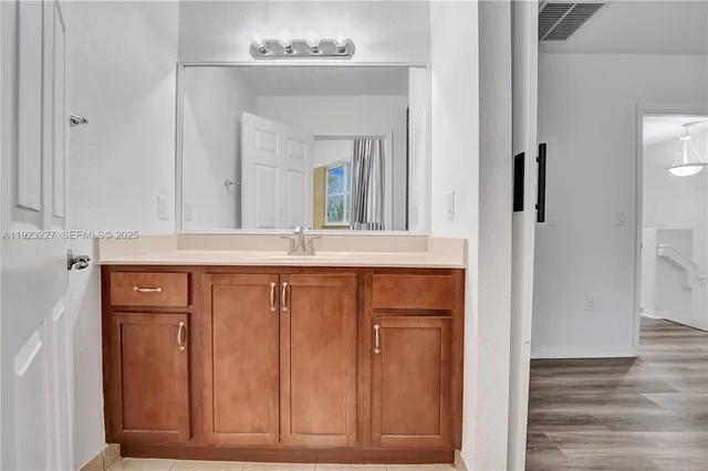 wooden floor with a mirror