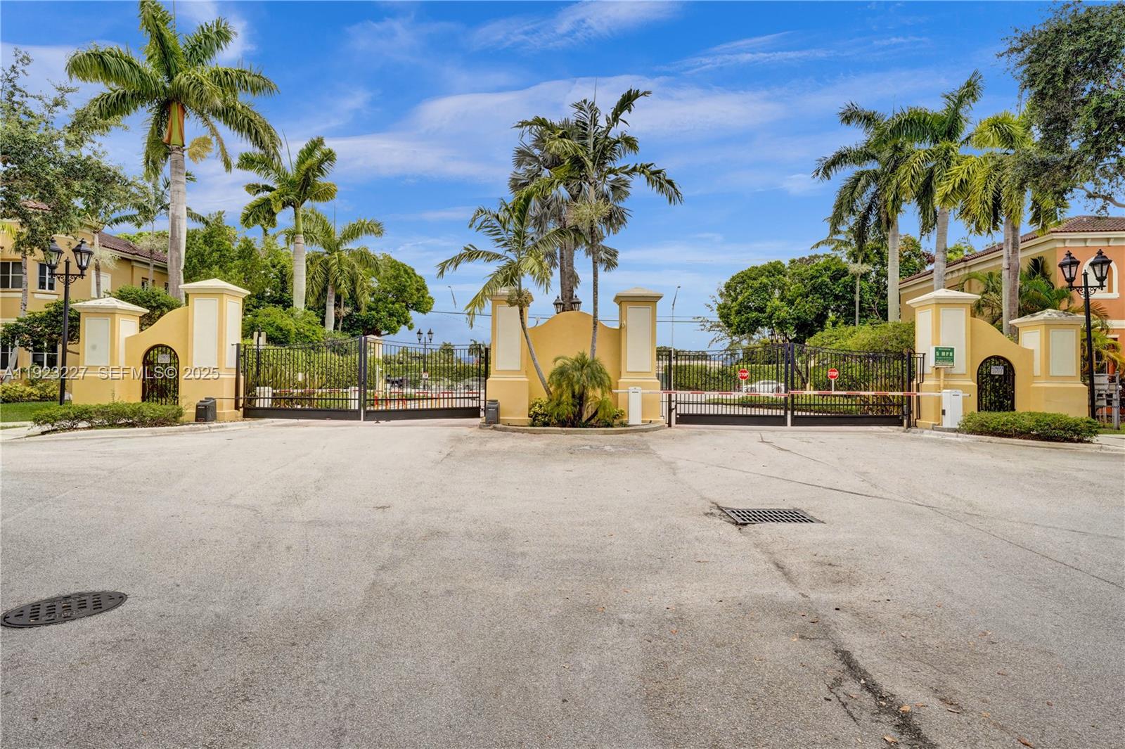 8993 Southwest 17th Court Miramar, FL 33025 - Photo 35 of 41 a view of a street with palm trees