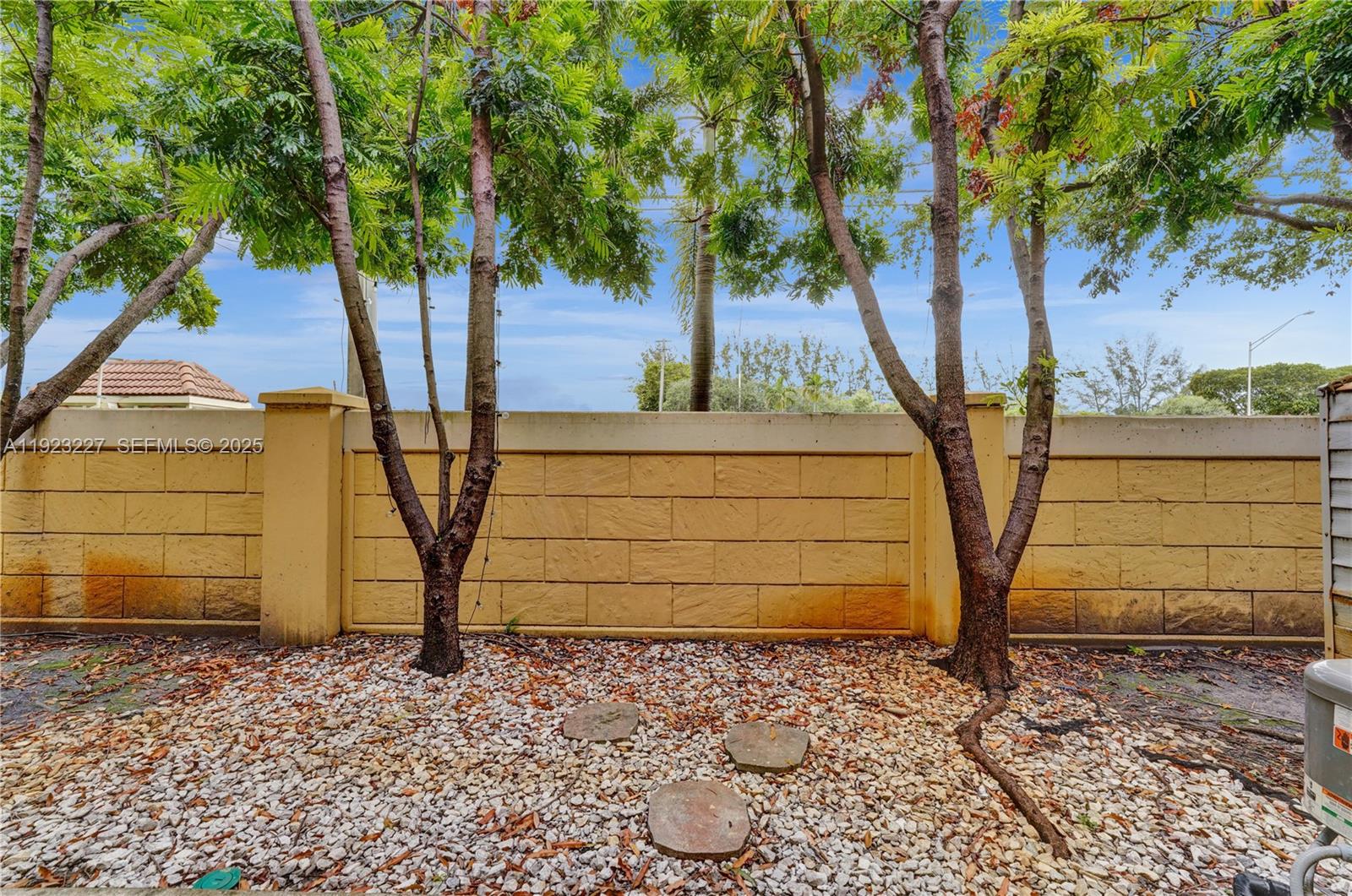 8993 Southwest 17th Court Miramar, FL 33025 - Photo 37 of 41 a front view of a house with a yard