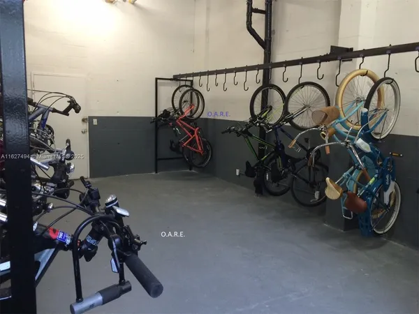a view of a bike storage and utility room