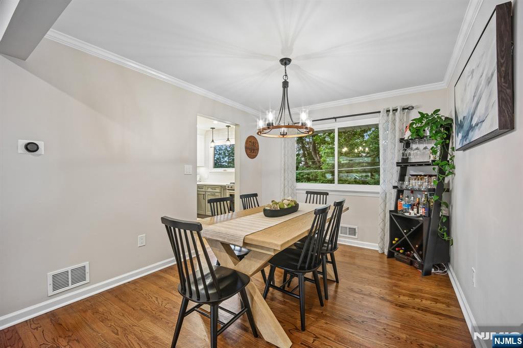 23 Andover Place Bloomfield, NJ 07003 - Photo 7 of 42 a view of a dining room with furniture window and wooden floor