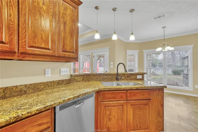 a bathroom with double vanity sink and a mirror