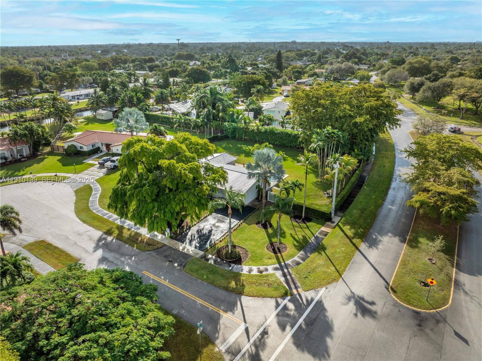10320 Southwest 91st Street Miami, FL 33176 - Photo 2 of 30 an aerial view of residential houses with outdoor space