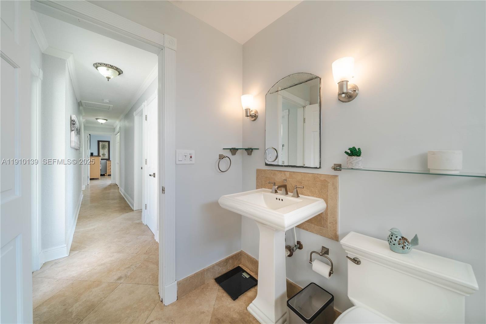 10320 Southwest 91st Street Miami, FL 33176 - Photo 23 of 30 a bathroom with a sink a toilet and a mirror