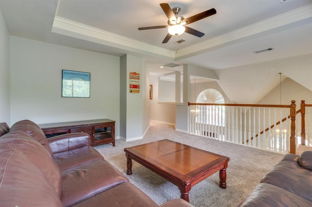 18 Greenleaf Drive Trophy Club, TX 76262 - Photo 15 of 25 a living room with furniture a ceiling fan and a rug