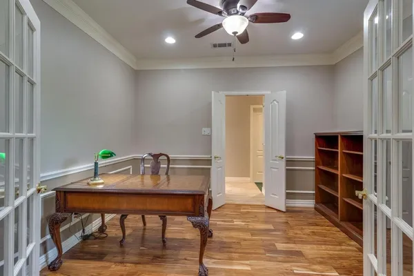 a workspace with furniture and window