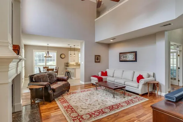 a living room with furniture and a couch