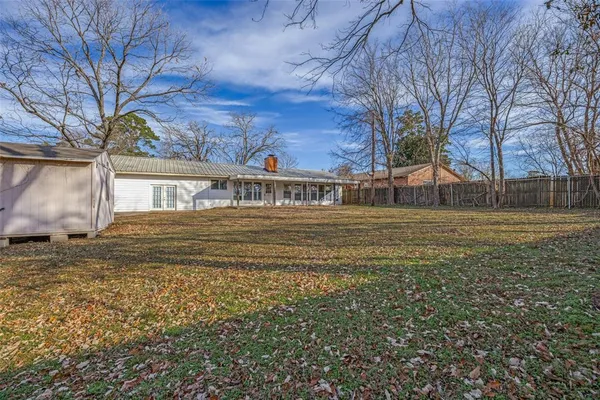 a house view with a outdoor space