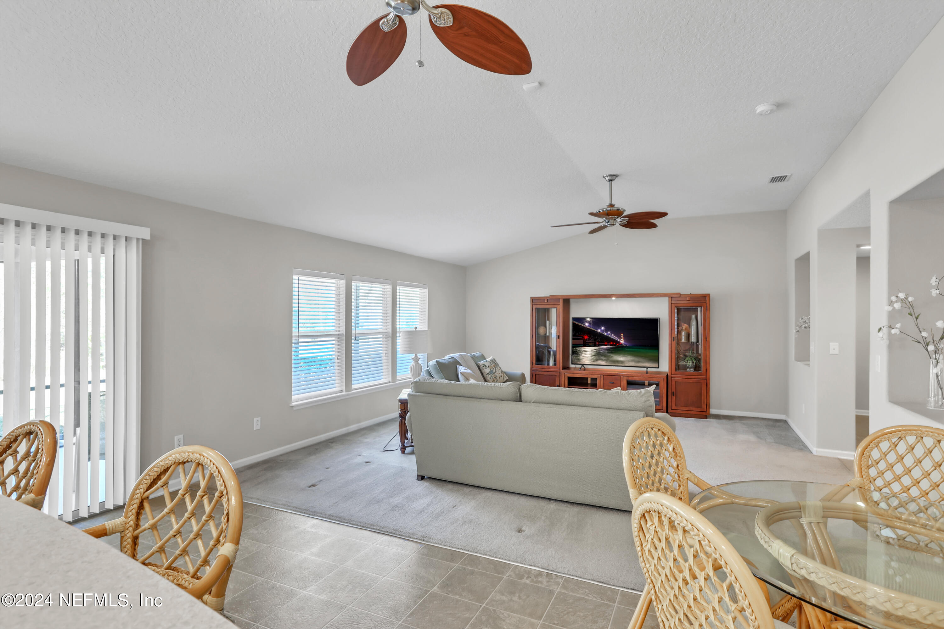 1184 Nochaway Drive St. Augustine, FL 32092 - Photo 13 of 39 a living room with furniture and a window