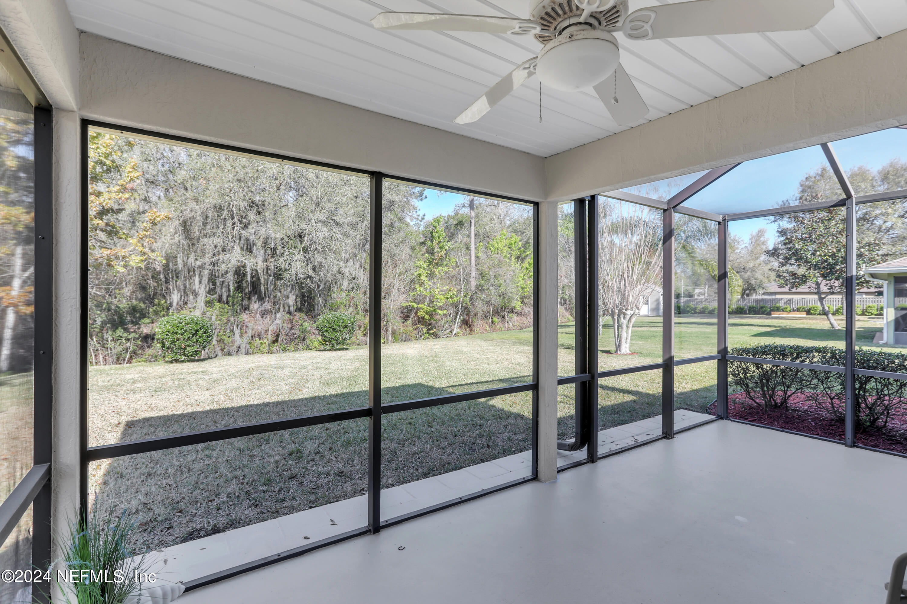 1184 Nochaway Drive St. Augustine, FL 32092 - Photo 2 of 39 a view of a room with window and ceiling fan