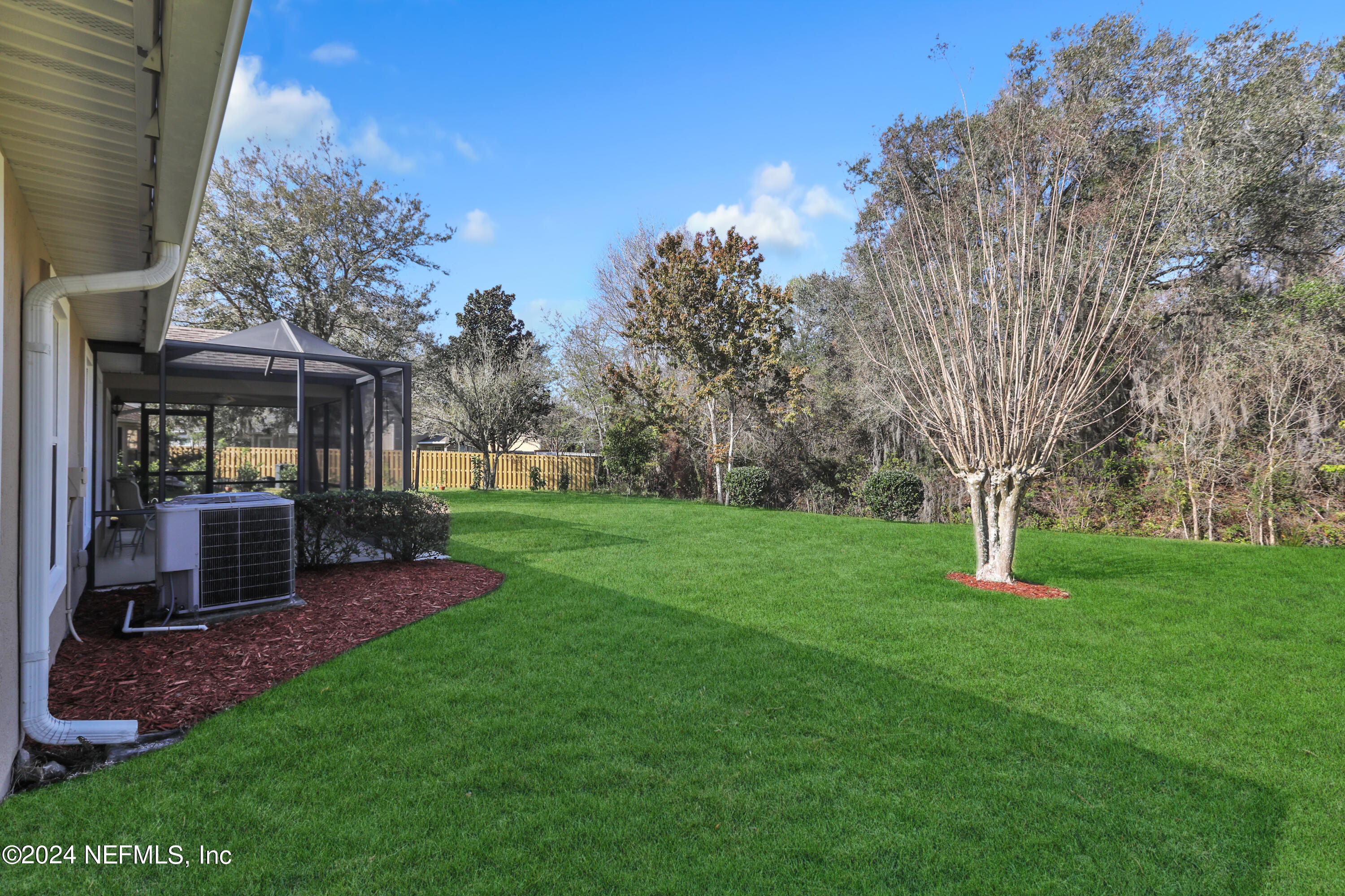 1184 Nochaway Drive St. Augustine, FL 32092 - Photo 24 of 39 a view of a chair and table in backyard of the house
