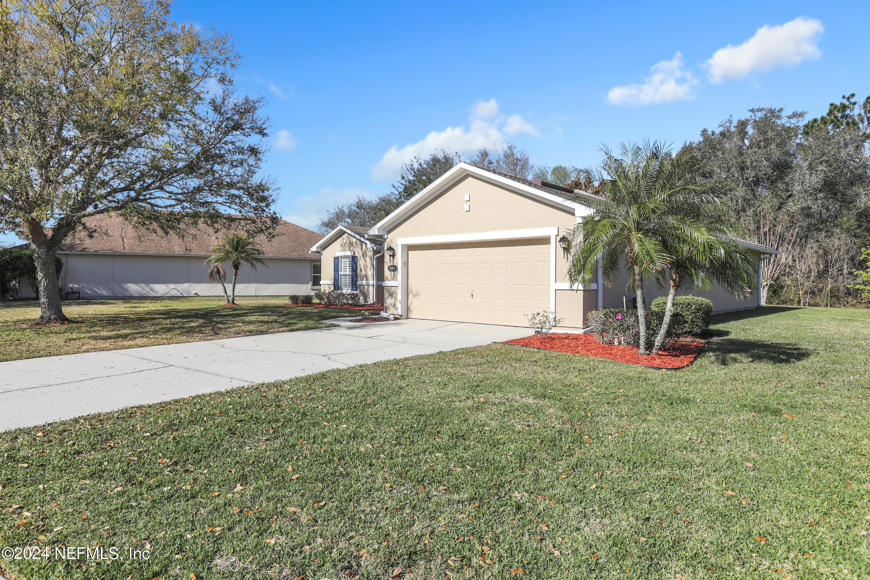 1184 Nochaway Drive St. Augustine, FL 32092 - Photo 27 of 39 a view of a house with a yard