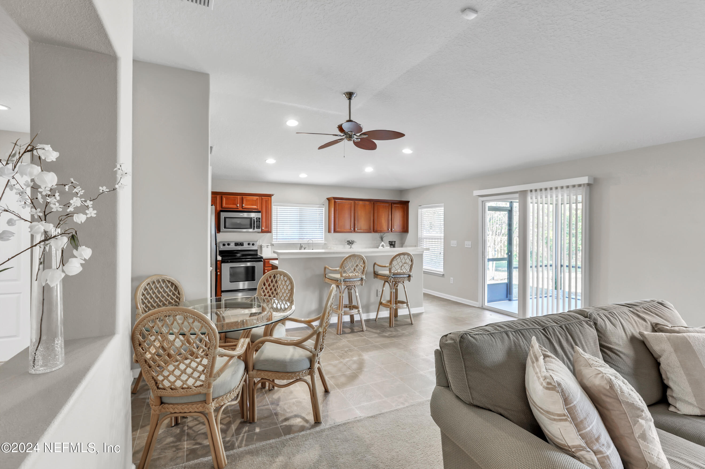 1184 Nochaway Drive St. Augustine, FL 32092 - Photo 3 of 39 a living room with furniture and a large window