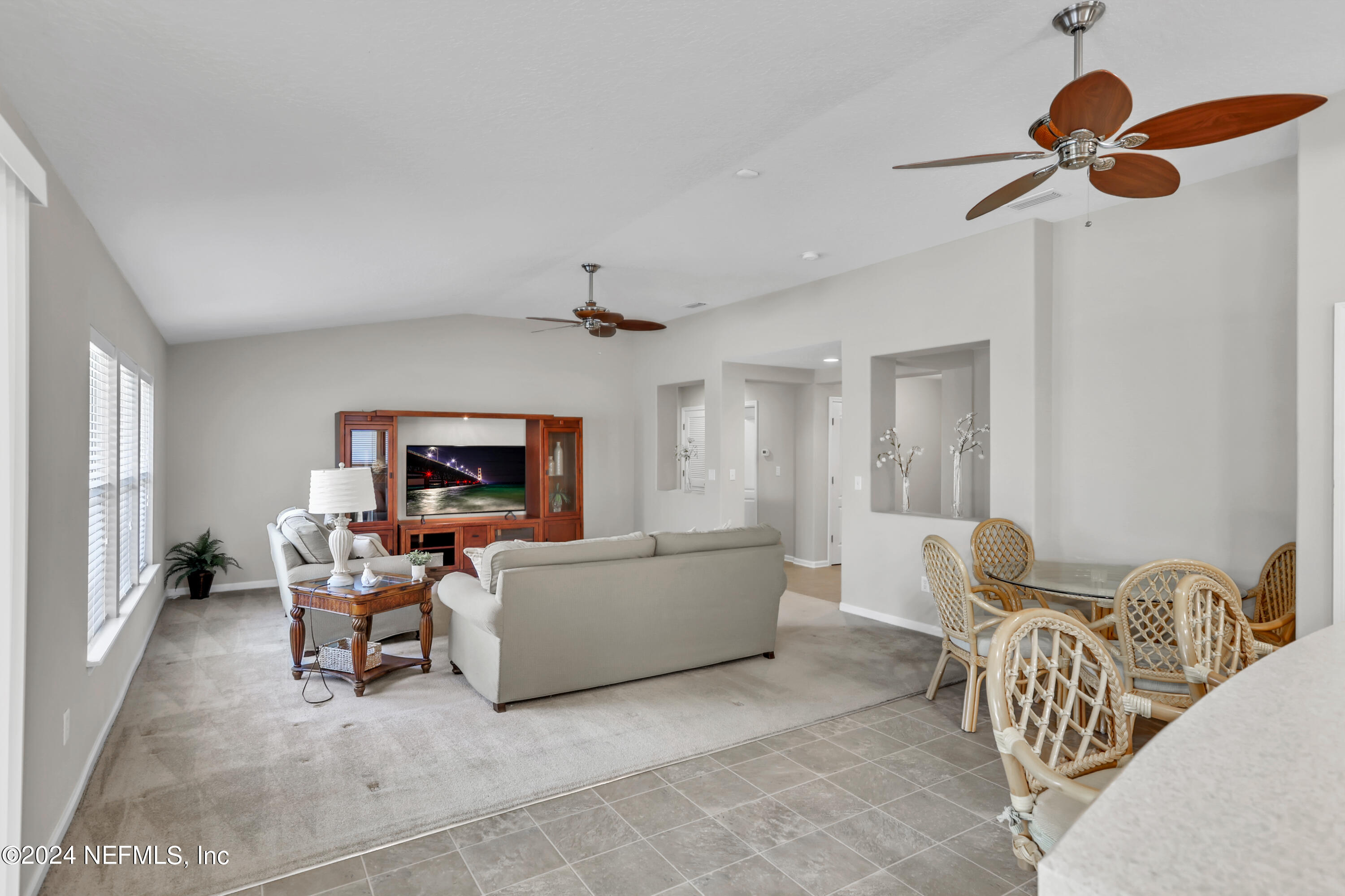 1184 Nochaway Drive St. Augustine, FL 32092 - Photo 5 of 39 a living room with furniture and a flat screen tv