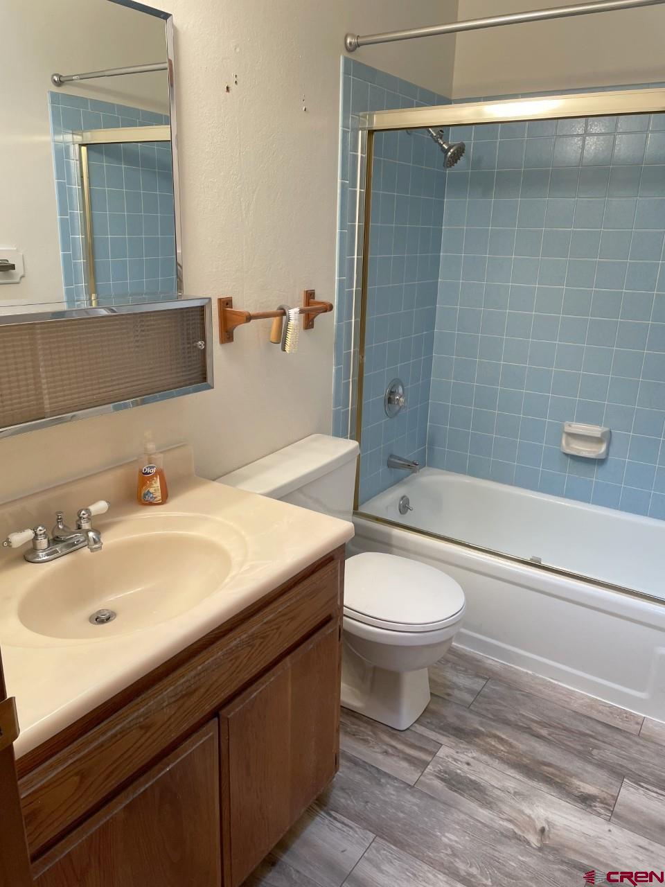 21566 Uintah Road Cedaredge, CO 81413 - Photo 14 of 33 a bathroom with a sink a toilet and shower