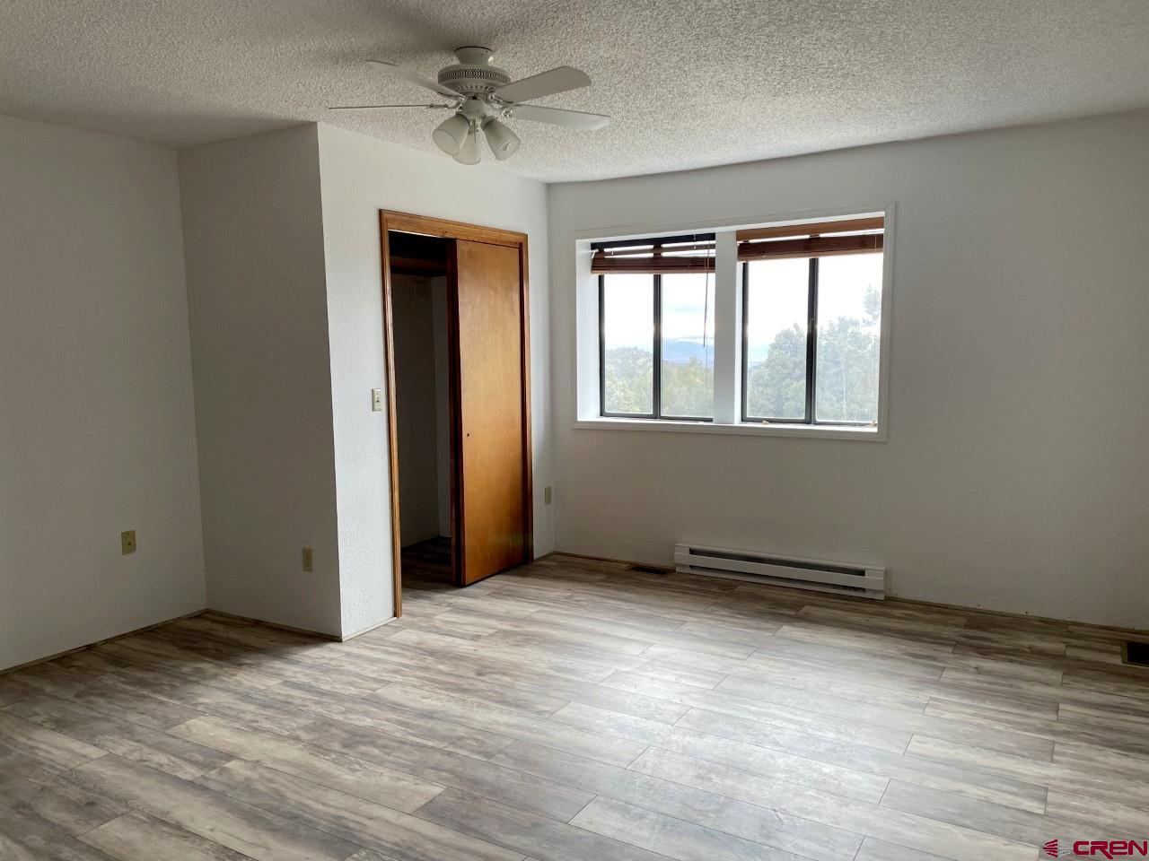 21566 Uintah Road Cedaredge, CO 81413 - Photo 15 of 33 a view of an empty room with a window