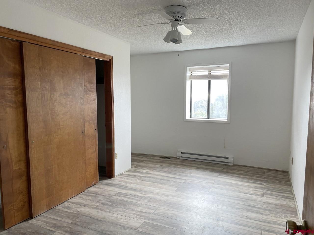 21566 Uintah Road Cedaredge, CO 81413 - Photo 19 of 33 a view of an empty room with a window