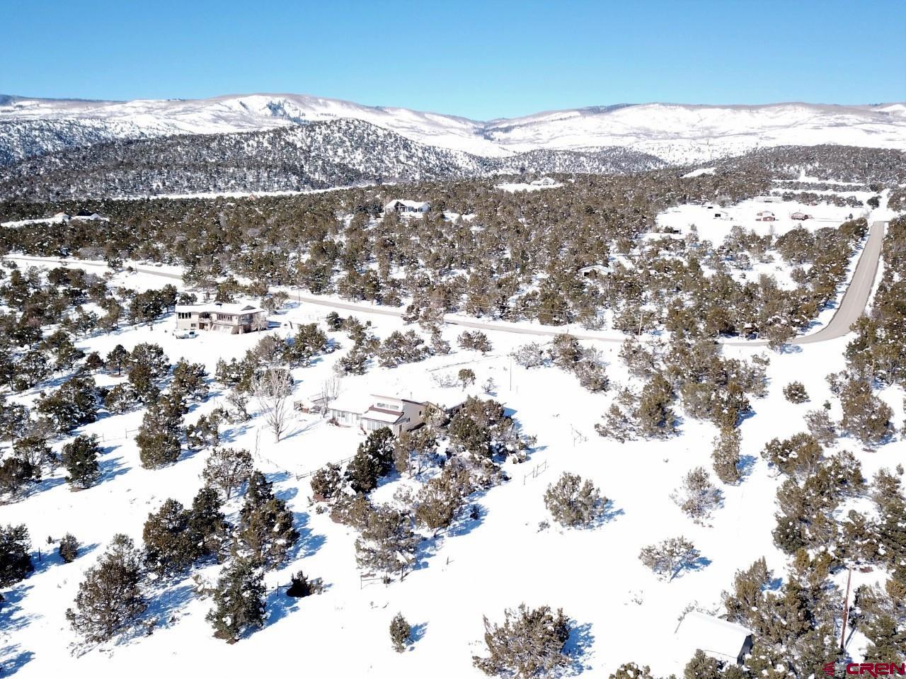 21566 Uintah Road Cedaredge, CO 81413 - Photo 2 of 33 a view of lot of covered with snow