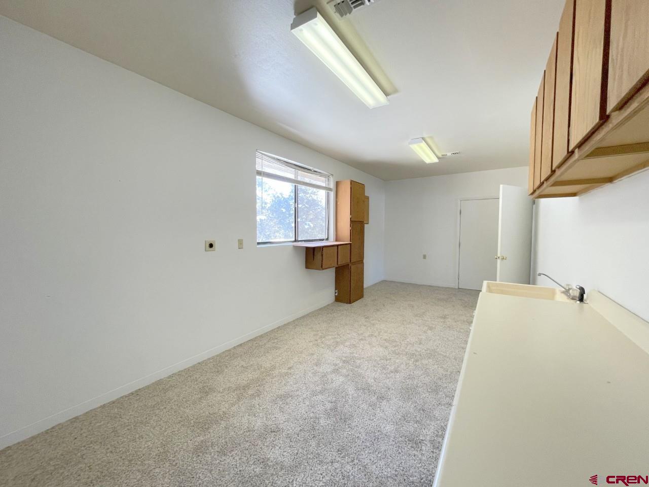 21566 Uintah Road Cedaredge, CO 81413 - Photo 25 of 33 a view of empty room with window