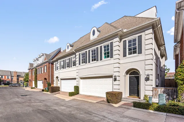a front view of a house with yard