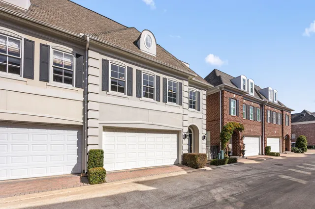 a front view of a building with a road