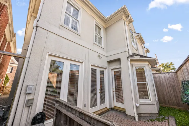 a view of a brick house with a window