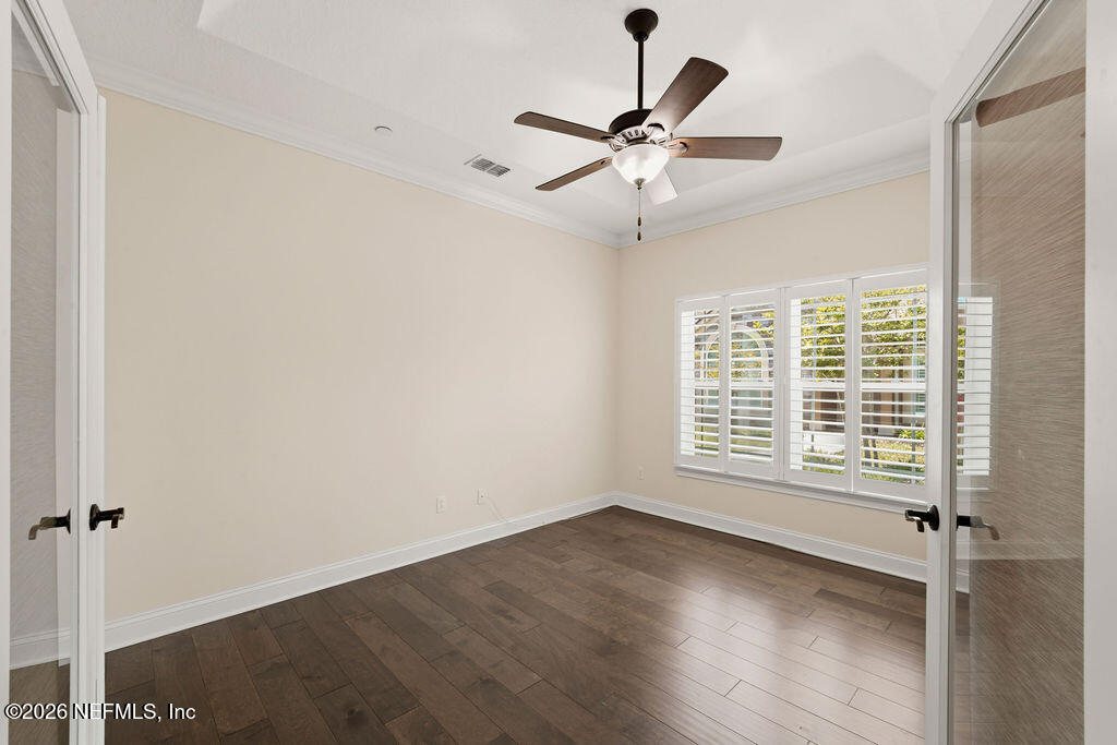 48 Ocale Court St. Augustine, FL 32084 - Photo 17 of 59 a view of an empty room with wooden floor and a window