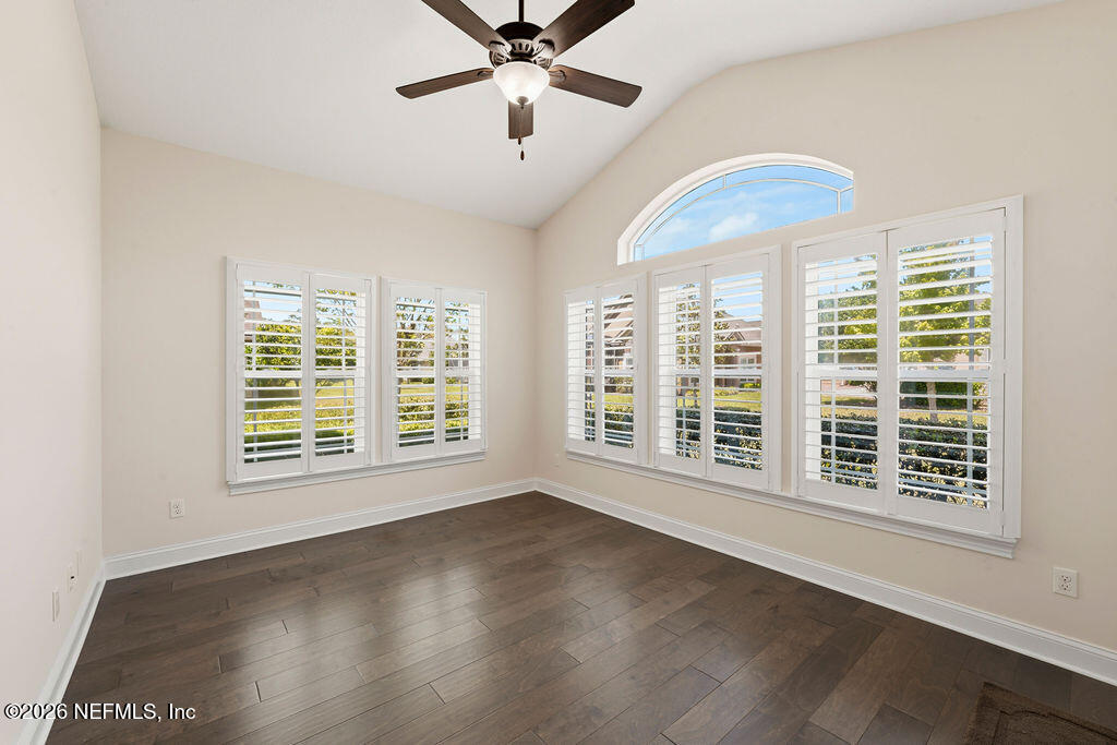 48 Ocale Court St. Augustine, FL 32084 - Photo 20 of 59 a view of an empty room with a window and wooden floor